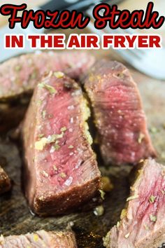 sliced steak on a plate with a fork and knife