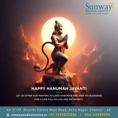 an advertisement for happy hanumann javanti with a lion statue in front of the sun