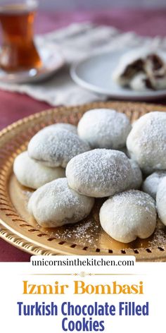 there is a plate with cookies on it and the words iznir bonbasi turkish chocolate filled cookies