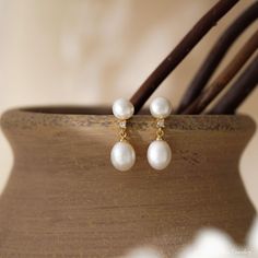 This exquisite jewelry made from genuine freshwater pearls is perfect for weddings. Its timeless elegance suits brides, bridesmaids, and the mother of the bride. Ideal for any special occasion, it adds a touch of sophistication and makes a cherished gift. F E A T U R E S * 100% Natural Freshwater Pearls * Material: High Quality Solid Copper * Finish: 18K Gold * Sold as a pair A T T E N T I O N ♥ Please keep in mind that these are natural pearls. While I do my best to closely match each pair, the Drop Earrings Pearl, Freshwater Pearl Drop Earrings, Jewelry Bridesmaid, Christmas Gift For Her, Earrings Pearl, Sell Gold, Gifts Christmas, Christmas Gifts For Her, Exquisite Jewelry