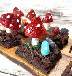 some brownies are decorated with mushrooms and candy