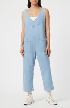 Rock a casual-cool vibe in this lightweight denim jumpsuit designed with front patch pockets and a cropped length. 23 1/2" inseam; 17 1/2" leg opening Side button closure Deep V-neck Sleeveless Front patch pockets 76% cotton, 24% rayon Machine wash, dry flat Made in Turkey Casual Denim Shortalls With Pockets, Medium Wash Straight Leg Shortalls In Casual Style, Medium Wash Straight Leg Shortalls, Medium Wash Straight Leg Shortalls Casual, Medium Wash Relaxed Fit Denim Jumpsuit With Bib Front, Casual Medium Wash Straight Leg Shortalls, Light Wash Relaxed Fit Denim Jumpsuit For Spring, Relaxed Fit Light Wash Denim Jumpsuit For Spring, Casual Medium Wash Shortalls With Pockets