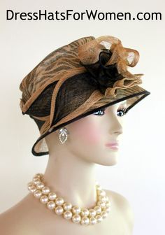 Ladies Black And Brown Beige Animal Print Sinamay Straw Designer Fashion Hat. This Dress Hat Is Suited For Weddings, Formals, Bridal, Mother Of The Bride, The Kentucky Derby And Horse Races.

Measurements: Crown Measures 22.5".  This lovely headpiece is suited for Spring, Summer or Early Fall.

All Sales Are Final. Fitted Cloche Hat For Summer Party, Black Summer Hat For Wedding, Fitted Summer Party Cloche Hat, Summer Party Fitted Cloche Hat, Black Summer Wedding Hat, Summer Black Wedding Hat, Summer Wedding Black Hat, Black Mini Hats For Summer Weddings, Elegant Black Mini Hat For Summer