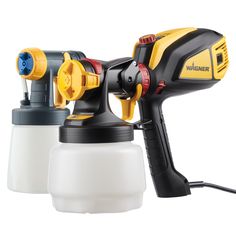 two yellow and black sprayers are next to each other on a white background,