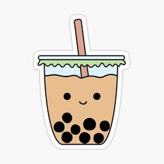 a drink with a straw in it and polka dots on the bottom sticker is shown