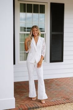 Off white blazer pants set Lace material Shoulder pads Front button closure Collared neckline Quarter-length sleeves Faux front side pockets High waisted Front clasp closure Flared bottom hem Lined 31" inseam 55% Cotton, 45% Nylon Model is 5'6" with a 34" bust, a 27" waist, and 36" hips wearing a size small. Size Rec: 0-2:S, 4-6:M, 8:L Blazer Pants Set, Off White Blazer, Lace Blazer, Lace Material, Dresses By Length, White Blazer, Short Rompers, Skirt Pants, Shoulder Pads