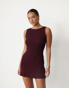 Introducing the Aylah Mini Dress - a captivating blend of allure and sophistication. Featuring a backless detail with an adjustable tie for a touch of elegance, this dress boasts a high boatneck that exudes understated charm. Crafted from stretchy fabric, it ensures comfort without compromising on style. While not line Water Drip, Boat Neck Dress, Garment Fabric, How To Love, Engagement Outfits, Minimalist Wardrobe, Drip Dry, How To Look Classy, Dress 100