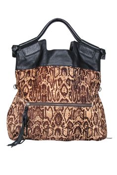 Add some slither to your style with this Foley & Corinna bag! Created with a sleek snakeskin print on super soft calf hair, this spacious hobo-style beauty is a must-have for bohemian babes who love their animal print. Throw on a flowy maxi dress and strappy sandals, grab this statement piece and you'll be looking fierce and fab for the farmers' market and beyond! Calf hair upper w/ snakeskin print Black leather trim Silver-toned hardware Top carrying handles Convertible shoulder strap Open top Leopard Print Leather Bag With Zipper, Everyday Snake Print Satchel Bag, Leopard Print Leather Shoulder Bag With Leather Handles, Leather Shoulder Bag With Leopard Print And Leather Handles, Chic Snake Print Shoulder Bag For Everyday Use, Leather Tote Bag With Snake Print, Chic Leather Shoulder Bag With Snake Print, Leather Snake Print Satchel Shoulder Bag, Leather Satchel Shoulder Bag With Snake Print