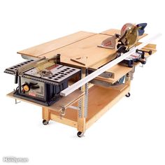 a table saw is on top of a workbench with tools attached to it