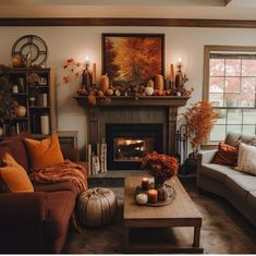 a living room filled with furniture and a fire place