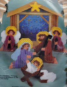 a cross stitch nativity scene with the birth of jesus