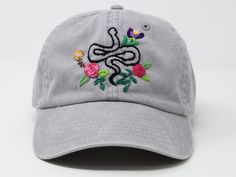 Bee and flower is 100% hand embroidered on a 100% cotton baseball cap. Hat is one size fits all with adjustable back strap. Unique cap, be happy! I am also open for customization. If you want the item in different colors, please message me, it will take additional 2-3 days of handling time. Free first class shipping, upgradable priority mail service. 30 days return policy, feel confident at your purchase! Spring Snapback Hat With Embroidered Logo And Curved Bill, Spring Dad Hat With Embroidered Logo And Flat Brim, Adjustable Flat Brim Dad Hat For Spring, Adjustable Dad Hat With Flat Brim For Spring, Casual Embroidered Flat Brim Trucker Hat, Spring Snapback Hat With Embroidered Logo And Curved Visor, Spring Snapback Hat With Embroidered Logo, Adjustable Fitted Baseball Cap With Embroidered Patch, Embroidered Adjustable Fitted Hat With Flat Brim