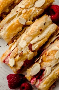 raspberry and almond pastries on a white plate