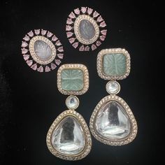 This beautiful earrings set has an excellent finish and gives out an exquisite sense of style. If you are looking for an amazing Fashion Jewelry set for special occasions such as Anniversary, Engagement, Party, Wedding, or for gifting, then your search ends here. Handmade Indian Temple Jewelry, best to wear it for traditional ceremonies or Indian wedding. This bridal jewelry has an ethnic finish. It has Cubic Zircon stones with semi-precious ruby and emeralds. It is a Bollywood style one gram jewelry. There are long and short patterns of Indian jewelry in Kundan, Pearls, CZ, American Diamond, ruby, emerald, Polki, kemp to suit every occasion of South Indian and North Indian weddings.   Color, shades, texture displayed may slightly vary from the actual product due to digital image limitatio Elegant Party Earrings With Stones, Fusion Style Elegant Party Earrings, Elegant Fusion Style Party Earrings, Dangle Stone Earrings For Wedding, Party Gemstone Drop Bridal Earrings, Dangle Earrings With Stones For Wedding, Gemstone Drop Bridal Earrings For Party, Party Bridal Drop Earrings With Gemstones, Wedding Drop Earrings With Stones