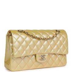 This medium Chanel classic double flap bag is in yellow iridescent caviar leather with gold tone hardware and features a front flap with signature CC turnlock closure, half moon back pocket, and adjustable interwoven light gold tone chain link and yellow leather shoulder strap.The interior is lined in yellow iridescent leather with the "love letter" zipper compartment under the first flap, an "outer" slit pocket is under the second flap, and an interior compartment with two open pockets separated by a "lipstick" compartment.Collection: 2023 (RFID)Origin: FranceCondition: New and never worn (plastic on hardware)Accompanied by: Chanel Box, Chanel dustbag, carebook and RFIDMeasurements: 10" width x 6" height x 2.75" depth; 16.5" strap drop (9.5" doubled) Goyard Bag Price, Chanel Box, Goyard Bag, Fancy Bags, Price Guide, Classic Bags, Yellow Leather, Top Ten, Luxury Brands