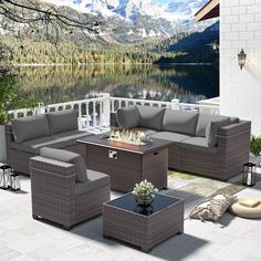 an outdoor patio furniture set with fire pit