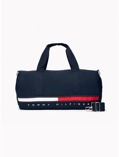 Tommy Hilfiger unisex bag. Designed with ample room for your daily essentials, our duffle is lined to keep your gear dry, and durable enough to take anything you throw at it (or in it). Finished with our iconic flag stripe logo.  Material: 100% Cotton. Tommy Hilfiger Bag, Small Duffle Bag, Gentleman Aesthetic, Men's Shoes Accessories, Luxury Lifestyle Dreams, Daily Essentials, Tommy Jeans, Luxury Lifestyle, Fashion Brand