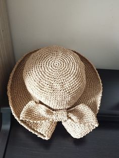 Enhance your wardrobe with our Handcrafted Crochet Straw Hat. This elegant accessory blends sturdy straw with delicate crochet details, creating a unique and refined look. Perfect for sunny days, beach outings, or casual brunches, it offers both style and sun protection. Add a touch of handmade charm to your ensemble with this sophisticated and versatile hat! Elegant Handmade Sun Hat For Vacation, Handmade Bohemian Straw Hat For Garden Party, Elegant Handmade Panama Hat For The Beach, Elegant Handmade Panama Hat For Beach, Elegant Adjustable Crochet Hat For Vacation, Hand-knitted Crochet Hat For Beach, Beach Crochet Hat Hand Knitted, Adjustable Woven Straw Crochet Hat, Adjustable Straw Crochet Hat