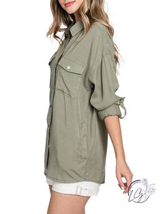 Oversized utility Shirt Made of Soft Washed Tencel. This Shirt has long sleeves with roll-up snaps, chest and side pockets. It's a Light and Oversized Top to Wear Open or Buttoned Up. Fabric: 100% Tencel Khaki Long Sleeve Tops With Buttoned Pockets, Oversized Khaki Shacket With Pockets, Oversized Khaki Shacket With Buttoned Pockets, Fall Top With Buttoned Pockets And Shirttail Hem, Spring Utility Tops With Buttoned Pockets, Oversized Casual Utility Jacket With Long Sleeves, Utility Button-up Tops For Spring, Spring Utility Button-up Top, Oversized Khaki Button-up Utility Jacket