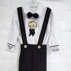 NOTE Please visit my shop for many other kids costumes and custom made outfits.. https://www.etsy.com/shop/SammysCostumes/?etsrc=sdt This Personalized Baby Boys 1st Birthday Suit Set Tuxedo outfit is custom made to order. It comes with boys tuxedo pants, Boys Boss Baby Embroidered Shirt, Suspenders, Boys Bowtie and Free personalization on arms. Boys Boss Baby 1st Birthday Outfit can also be made for matching siblings, twins boss family party. This boys suit set is perfect for 1st 2nd 3rd up to 8th Year old birthday, or 3 6 9 12 month photoshoot picture or Boss Family Photoshoot outfit. Complete your look with newspaper boys hat.   FAST SHIPPING and FREE EMBROIDERY  Matching shoes can be purchased for Age 1 and Age 2  NOTE You can order different ages up to 8 years Old Suit Set NOTE You can Customizable Fitted Sets For Baptism, Tuxedo Outfit, Newspaper Boy Hat, Boys Hat, Boys Tuxedo, Baby Boss, 1st Birthday Outfit, Family Photoshoot Outfits, Matching Shoes