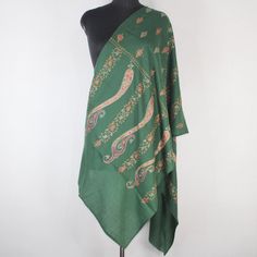 Kashmiri sozni Embroidered Wool Stole.This Multi Color Stole Is Made Of Fine Merino Wool Its Embroidered With Multi Colours.The Embroidery Done On This Is A Traditional Kashmiri Embroidery Known As 'sozni Work''.Now Own A Rare Genuine Kashmiri Hand Embroidered Stole Which Takes Many Months To Create, Unique In Design And Colour And, Have Never Been Replicated. Condition: Brand New Size: 28" X 80" (70 Cm X 200 Cm) Approx Colour: Green Style: Scarf Wrap Material: Fine Merino Wool Embroidery:  sozn Bohemian Green Pashmina Shawl In Traditional Drape, Green Embroidered Bohemian Shawl, Traditional Embroidered Green Shawl, Green Embroidered Shawl For Festivals, Traditional Green Winter Shawl, Green Shawl With Traditional Patterns For Festivals, Green Traditional Pashmina Shawl With Patterns, Traditional Green Pashmina Shawl With Patterns, Green Traditional Pashmina Shawl