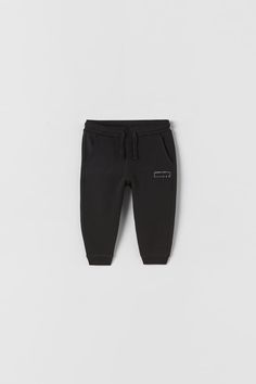 PLUSH JOGGING PANTS - Black | ZARA United States Winter Cotton Sweats With Elastic Cuffs, Casual Cotton Fleece Sweats For Loungewear, Casual Cotton Fleece Sweats For Winter, Zara Cotton Sweatshirt For Streetwear, Zara Sweatshirt With Graphic Print For Winter, Zara Sporty Sweatshirt For Streetwear, Basic Letter Print Sweats For Winter, Zara Letter Print Sweatshirt For Fall, Casual Zara Sweatshirt For Streetwear