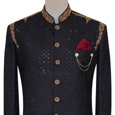 This exquisite Sequine Fabric Embroidered Black Classic Black Wedding Sherwani for Groom with Golden Embellishments is the perfect attire for your special day. Made with premium quality fabric and adorned with golden hand embellishments, this sherwani is sure to turn heads. The classic black color is timeless and elegant, while the golden embellishments add a touch of luxury. Ceremonial Black Sherwani With Dabka Work, Black Traditional Wear With Gold Embroidery For Wedding, Designer Black Traditional Wear With Intricate Embroidery, Luxury Black Bandhgala For Wedding, Designer Black Traditional Wear With Zari Work, Ceremonial Black Bandhgala With Dabka Work, Traditional Black Bandhgala With Zari Work, Luxury Black Bandhgala For Ceremonial Occasions, Black Nehru Jacket With Zari Work For Ceremonial Occasions