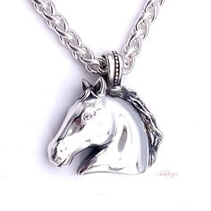 Ashley's Signature Sterling Silver Equus Horse Head Pendant with diamond eye is hand made and hand finished for superior quality by Ashley's, 1 1/4"w x 1 1/4"H (with bail). Add our new chain to make a beautiful necklace SKU# SC2674 (sold separately). Horse Halter, Equestrian Jewelry, Gold Horse, Horse Necklace, Diamond Eyes, Horse Head, Pave Diamonds, 4 H, Beautiful Necklaces