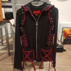 Normally Retails For $101 Plus About $20 Shipping From The Tripp Site, Worn Once For Fit Only! This Is A Slimmer Fit Hoodie Or "Hoody" As They Call It. I Am A Size Small To Medium And This Fit Me Comfortably. If You Wear Your Usual Size, It Will Likely Have More Of That Classic Emo Silhouette. The Ties On The Sides Do Make It Adjustable For A Few Inches. Fitted Long Sleeve Punk Hoodie, Red Casual Outerwear For Halloween, Red Long Sleeve Outerwear For Halloween, Red Gothic Outerwear For Winter, Gothic Red Outerwear For Halloween, Red Gothic Winter Outerwear, Red Fitted Outerwear For Alternative Fashion, Red Long Sleeve Outerwear For Alternative Fashion, Fitted Alternative Long Sleeve Hoodie