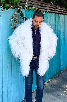 This amazing white long hair fur jacket was designed for fashion men who love to attract attention and stay in the spotlight. This trendy piece has the most bright color and you will feel warm when reaching the brisk winter season. M L size, 💯 handmade in California. ❤️❤️❤️ White Faux Fur Outerwear With Feather Trim, White Fluffy Long Sleeve Fur Coat, White Fur Coat With Faux Fur Lining For Winter, White Faux Fur Lined Coat For Winter, White Fur Coat For Fall, White Fur Coat With Faux Fur Lining, White Long Coat With Faux Fur Lining, White Faux Fur Lined Coat, White Faux Fur Trim Outerwear