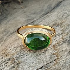 Cabochon Ring Green Tourmaline-14k Gold Cabochon Ring-Tourmaline Ring Women-18k Gold Ring-Statement Ring-Vintage Ring-October birthstone About Ring:- Gemstone = Green Tourmaline  Cabochon Lab [ If You Want Natural Tourmaline Cabochon Just Please message me For Have it At a reasonable Price.]  Gemstone Shape = Oval Cabochon ------------------------------------------------------------------------------------------------------------------------------------------------- Fast Shipping: It will take 1 Gold Tourmaline Ring For May Birthstone, Oval Tourmaline Ring For May Birthstone, Oval Tourmaline Emerald Ring With Bezel Setting, Tourmaline Bezel Set Ring In Oval Cabochon, Tourmaline Bezel-set Oval Cabochon Ring, Tourmaline Ring With Bezel Setting In Oval Cabochon, Tourmaline Rings, Jewelry Designing, Gold Statement Ring