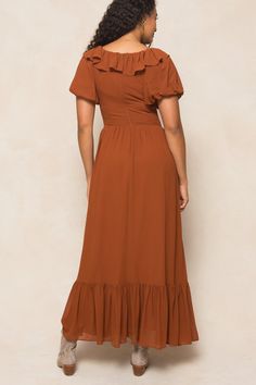 This modest women's dress is made of stunning amber chiffon, with a scoop neckline and ruffle detailing. Short puff sleeves and a maxi-length skirt with pockets add extra style. You'll want to twirl in the Billie Dress, a fully lined beauty, all season long! Fitted Chiffon Maxi Dress With Smocked Back, Modest Chiffon Maxi Dress, Fall Garden Party Maxi Dress With Short Sleeves, Fall Short Sleeve Maxi Dress For Garden Party, Short Sleeve Maxi Dress For Fall Garden Party, Flowy Ruched Maxi Dress For Garden Party, Fitted Maxi Dress With Smocked Back And Flutter Sleeve, Midi Length Maxi Dress With Fitted Bodice And Ruffles, Casual Maxi Dress With Fitted Bodice And Short Sleeves