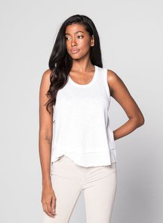 https://vimeo.com/544593994 Versatile White Tank Top For Layering, Effortless White Tops For Layering, White Spring Top With Frayed Hem, White Frayed Hem Top For Spring, Cotton Top With Frayed Hem For Layering, Cotton Tops With Frayed Hem For Layering, Casual Layered Tops For Spring, Summer Tops With Frayed Hem For Layering, Layered Tank Top