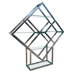 a metal and glass shelf with shelves on each side, in the shape of a diamond