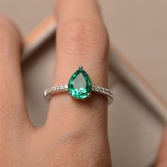 Teardrop Emerald Green Rings, Classic Green Teardrop Emerald Ring, Teardrop Green Emerald Rings, Green Emerald Teardrop Rings, Green Teardrop Emerald Rings, Green Teardrop Emerald Ring For May Birthstone, Green Pear-shaped Emerald Ring For Anniversary, Pear-shaped Green Emerald Ring, Green Solitaire Teardrop Jewelry