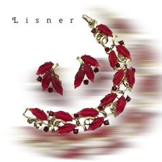 Great looking and highly collectible Lisner set. Dated late 1950s Comprised of glowing red molded thermoset leaves set  amid gold tone swirls and embellished with  deep red  round faceted rhinestones.  Gold tone finish setting. The bracelet is 7-1/8 inches long, and is 0-13/16 inches high (cm.18x2) weighs 37 grams - Secure Fold over clasp Show a fresh design composed of long leaves in cherry red thermoset that appear very bright, among gold curls, twisted branches, super sparkling ruby red rhine Vintage Jewelry For Holiday Parties, Vintage Holiday Jewelry For Party, Vintage Holiday Party Jewelry, Holiday Party Vintage Jewelry, Vintage Red Jewelry For Christmas, Mid-century Red Jewelry For Gift, Twisted Branches, Red Leaves, Gift Art