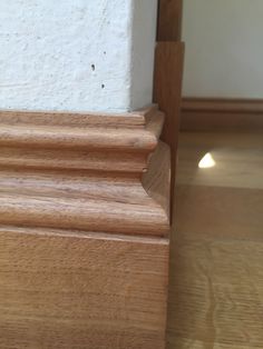 the corner of a wooden stair case