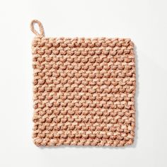 an image of a knitted dishcloth on a white background with clippings