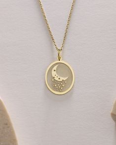 Gold Moon And Star Pendant - Moon And Star Gold Necklace ● Material of pendant: Solid Gold 14k ( REAL GOLD ) ● Metal Stamp: 14k ( REAL GOLD ) ● The pendant is available in 5 sizes: - 12x17 mm / 0,47 x 0,66 inches - 13x18 mm / 0,51 x 0,70 inches  In the photos - 14x19 mm / 0,55 x 0,74 inches  - 16x21 mm / 0,62 x 0,82 inches  - 18x24 mm / 0,70 x 0,94 inches ( In the photos the size is 13x18 mm / 0,51 x 0,70 inches ) ( Jump Ring inner diameter: 4 mm ) ● Material of chain: Solid gold 14k ( REAL GOLD ) It is thin and dainty and it is available in 4 sizes: - 40 cm / 15,75 inches ( Length ) - 45 cm / 17,72 inches ( Length ) In the photos - 50 cm / 19,68 inches ( Length ) - 55 cm / 21,65 inches ( Length ) ● Backside engraving is FREE ( Please use the personalization box for that.) ● If you want la Moon Phase Star Shaped Jewelry Gift, Moon Shaped Jewelry With Star Charm For Gifts, Moon Phase Star Charm Necklaces As Gift, Yellow Gold Moon-shaped Necklaces With Charms, Moon-shaped Yellow Gold Necklaces With Charms, Yellow Gold Moon Necklaces With Charms, Celestial Necklaces For Anniversary, Oval Pendant Jewelry With Moon Charm As Gift, Gold Necklace With Oval Moon Charm Pendant