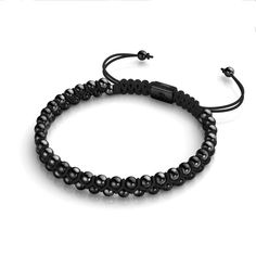 The Gunmetal Mini Vitality Bracelet from NOGU is a versatile accessory with a sleek gunmetal finish. This unisex bracelet features a stainless steel metal base and an adjustable, one-size-fits-all nylon cord. The cord is interwoven with twin rows of gilded 4mm beads, adding a touch of elegance. With its smooth beaded pull-cord drawstrings, this bracelet is easy to adjust and comfortable to wear. The Mini Vitality Bracelets are a great addition to any outfit, making them a must-have accessory. Mermaid Glass, Mala Bracelet, Black Agate, Glitter Glass, Strand Bracelet, Glass Bracelet, Black Mini, Faceted Crystal, Black Nylons