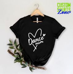 "Dance Mom Shirt,Dance Mom Gifts,Dance Shirts for Mama,Sports Mom Life Shirt,Mother's Day Gift,Dance Fan Shirt,Ballet Mom Tee,Cool Mom Gift Funny Good Moms Say Bad Words Shirt,Mother's Day Gift,Gift for Mama,Mothers Day Shirt,Mom Life Be Like, Mom gift,Cute Mom Shirt, Mama Tee, Retro Vintage Mama Shirt, Leopard Mama Shirt, Motherhood Shirt, Cute Mom Shirt,Mothers Day Gift, Mama T-shirt,Mom Life Shirt,Mama Shirt 🎁 Enjoy your shopping ! Need custom made shirts? Don't hesitate to message us! Thanks for your support! CustomShirtsZone_ Family ----- How To Order ----- 1-) Please, check and review all the photos. 2-) Choose your t-shirt size and color. *Different styles of shirts may have different shades of same color choice due to different manufacturer brands. *For this reason, we recommend y Black Summer Top For Dance Class, Fitted Crew Neck Shirt For Dance, Fitted Cotton Shirt For Dance, Black Letter Print Dance Top, Black Graphic Print Tops For Dance, Stretch Black Top For Dance Class, Black Short Sleeve Top For Dance Class, Fitted Black Top For Dance Class, Black Dancewear Tops For Dance