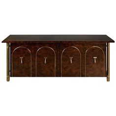 an art deco console table with three doors