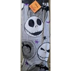 a towel with the faces of jack and sally from the nightmare before it's gone