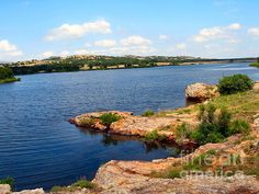 a large body of water surrounded by rocks