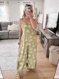 Our Florida Dreaming Boho Jumpsuit features a fun palm tree pattern print, v-neckline, adjustable straps, boho relaxed style fit, back tie detail, wide leg hemline. Model is 5'1", 34D, 6/28 and is wearing a size small. Item runs oversized. More details:100% polyester. hand wash or wash on cold and hang to dry. Tropical Printed V-neck Jumpsuits And Rompers, Casual V-neck Jumpsuits And Rompers With Tropical Print, Green Tropical V-neck Jumpsuits And Rompers, Sleeveless Rayon Jumpsuits And Rompers For Beach, Sleeveless Rayon Jumpsuit For Beach, Sleeveless Rayon Jumpsuit For The Beach, Casual Rayon Jumpsuits And Rompers For Vacation, Summer Wide Leg Jumpsuits And Rompers For Vacation, Summer Wide-leg Jumpsuits And Rompers For Vacation