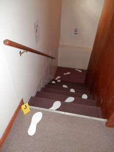 the stairs are painted with white polka dots