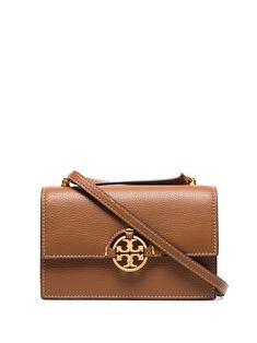 Light umber leather mini Miller shoulder bag from TORY BURCH featuring gold-tone hardware, single braided shoulder strap, single chain-link top handle, single flat top handle, foldover top with magnetic fastening, internal slip pocket, internal zip pocket, contrast stitching and signature Double T monogram plaque at the front. Tory Burch Miller Bag, Pretty Purses, T Monogram, Shoulder Bag Brown, Girly Bags, Shoulder Chain, Brown Bags