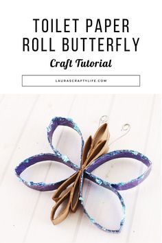 a paper roll butterfly craft with text overlay that reads, toilet paper roll butterfly craft