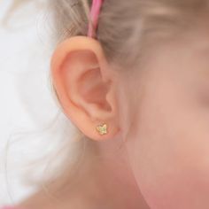 These timeless and classic clear cubic zirconia butterfly screw back earrings are perfect for babies to toddlers. Crafted of 14k yellow gold, a precious material that is suitable for children with sensitive skin. These round cubic zirconia butterfly earrings will make your sweet little girl look gorgeous all day and night. The safety screw backs make these earrings comfortable and suitable for toddlers on the move. Beautiful gift box included. Age Group: Lovely for Babies, Infants and Toddlers; Gold Earrings For Kids Baby, Baby Earrings Infants, Infant Earrings, Baby Jewelry Gold, Gold Earrings For Kids, Small Earrings Gold, Blackout Poetry, Baby Earrings, Poetry Art