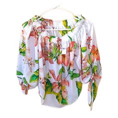 White With Green And Orange Red Floral Pattern Fitted White Printed Blouse, Spring Printed White Blouse, Chic White Printed Blouse, Printed White Blouse For Vacation, White Printed Blouse For Vacation, White Fitted Printed Blouse, White Blouse For Spring Vacation, White Floral Print Top For Day Out, White Blouse For Vacation In Spring